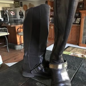 Tall Brown boots with gold plate accent
